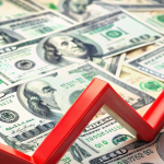 Indian rupee currency notes placed against a US dollar bill symbolizing rupee depreciation and forex market pressure amid rising oil prices