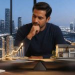 NRI investor comparing listed real estate trusts with physical property ownership.